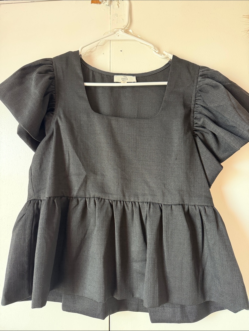 Entro Women’s Puff Sleeve Peplum Top in Charcoal